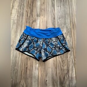 Limited edition blue snake skin lululemon speed up shorts
 size 4